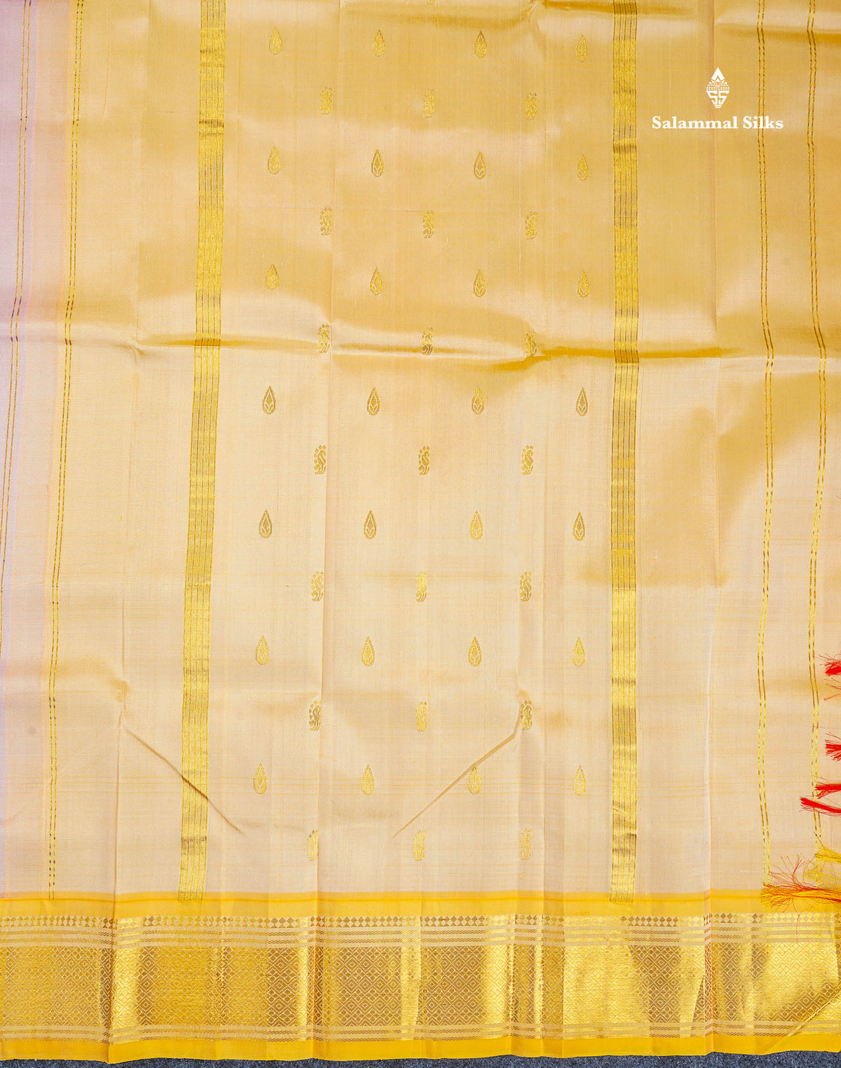 One Side Border Pure Silk Saree - Peach Colour Body Small Zari Butta With Contrast Yellow Traditional Border