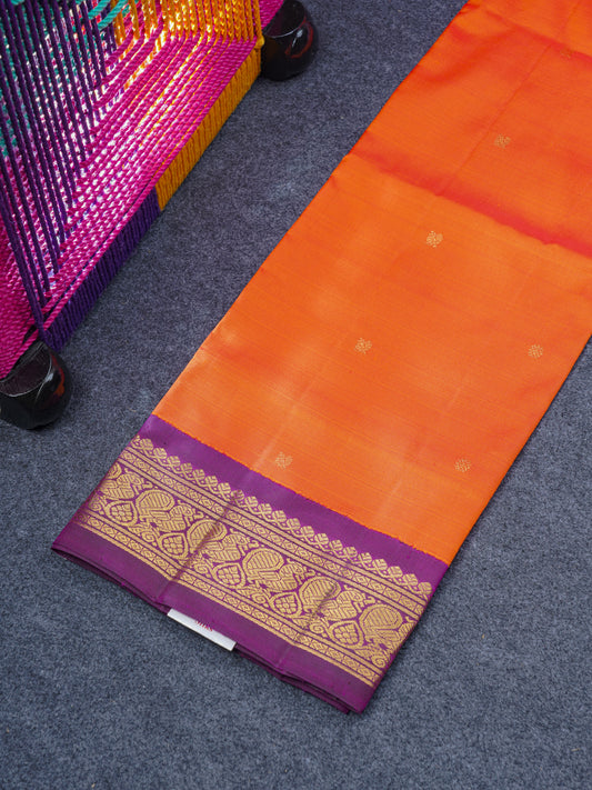 Pure Silk Pure Zari Pattu Pavadai (Orange) With Contrast Purple Border