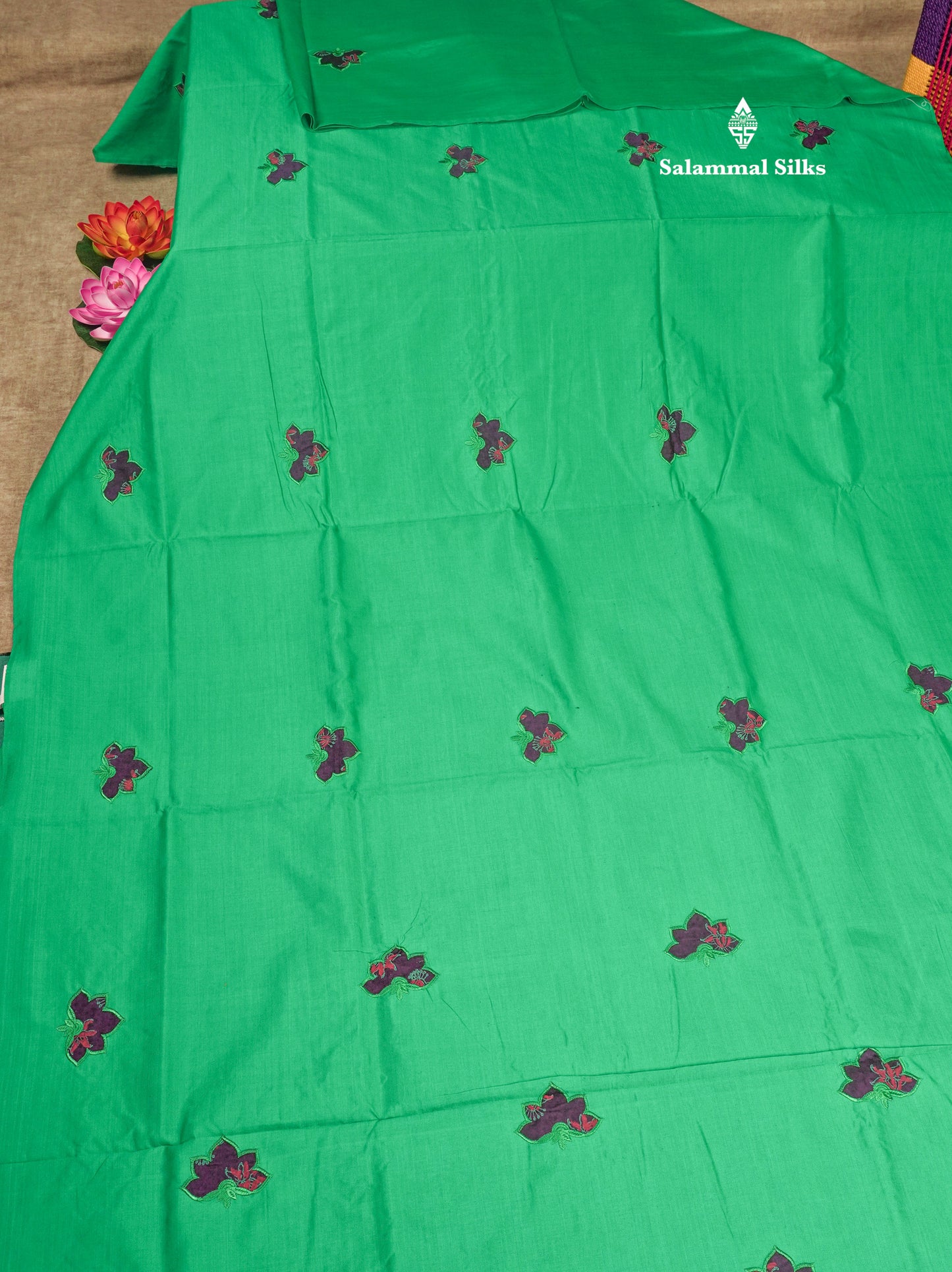 Saffire Green Mixed Cotton Printed Saree With Contrast Purple Blouse
