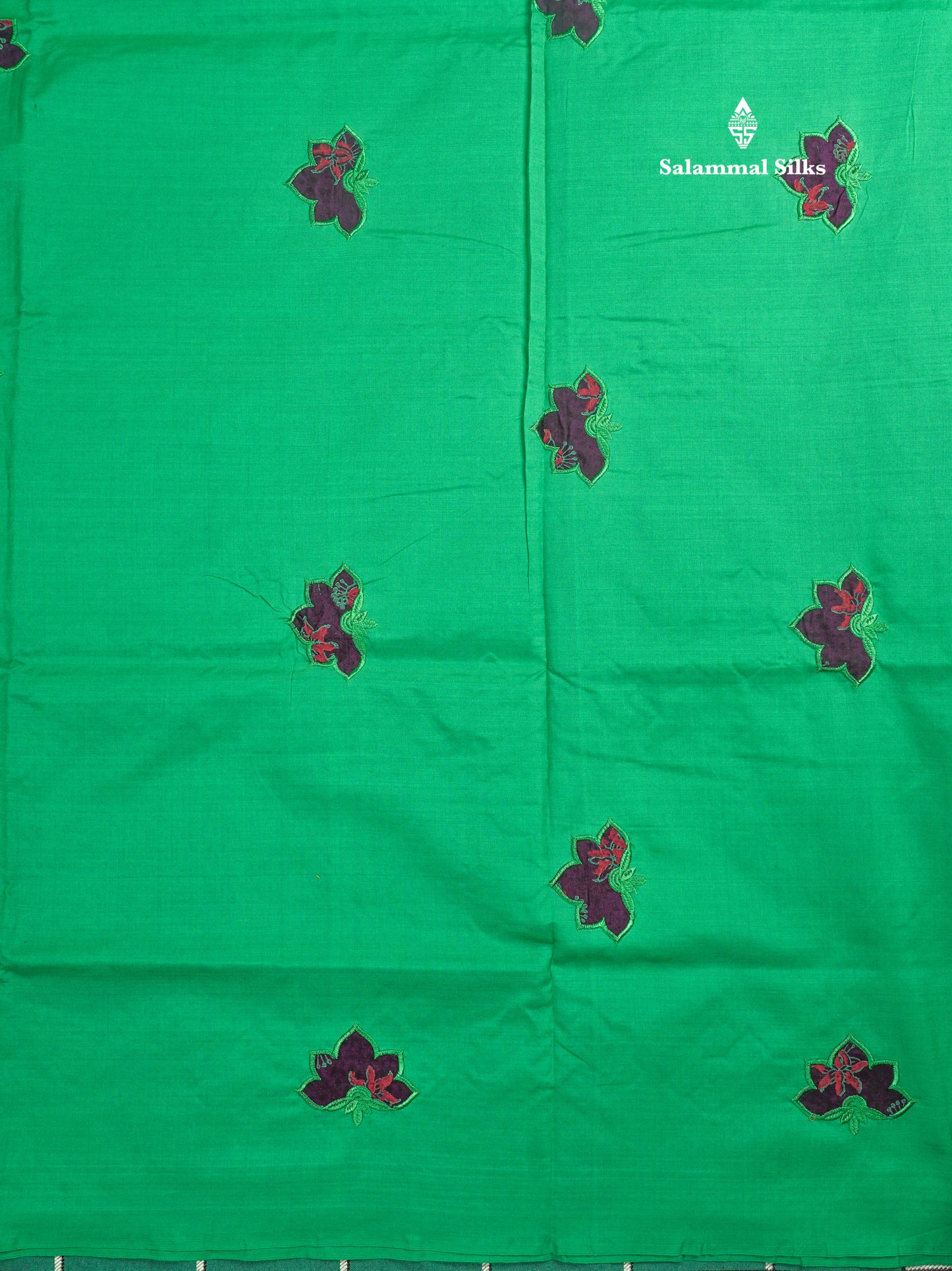 Saffire Green Mixed Cotton Printed Saree With Contrast Purple Blouse