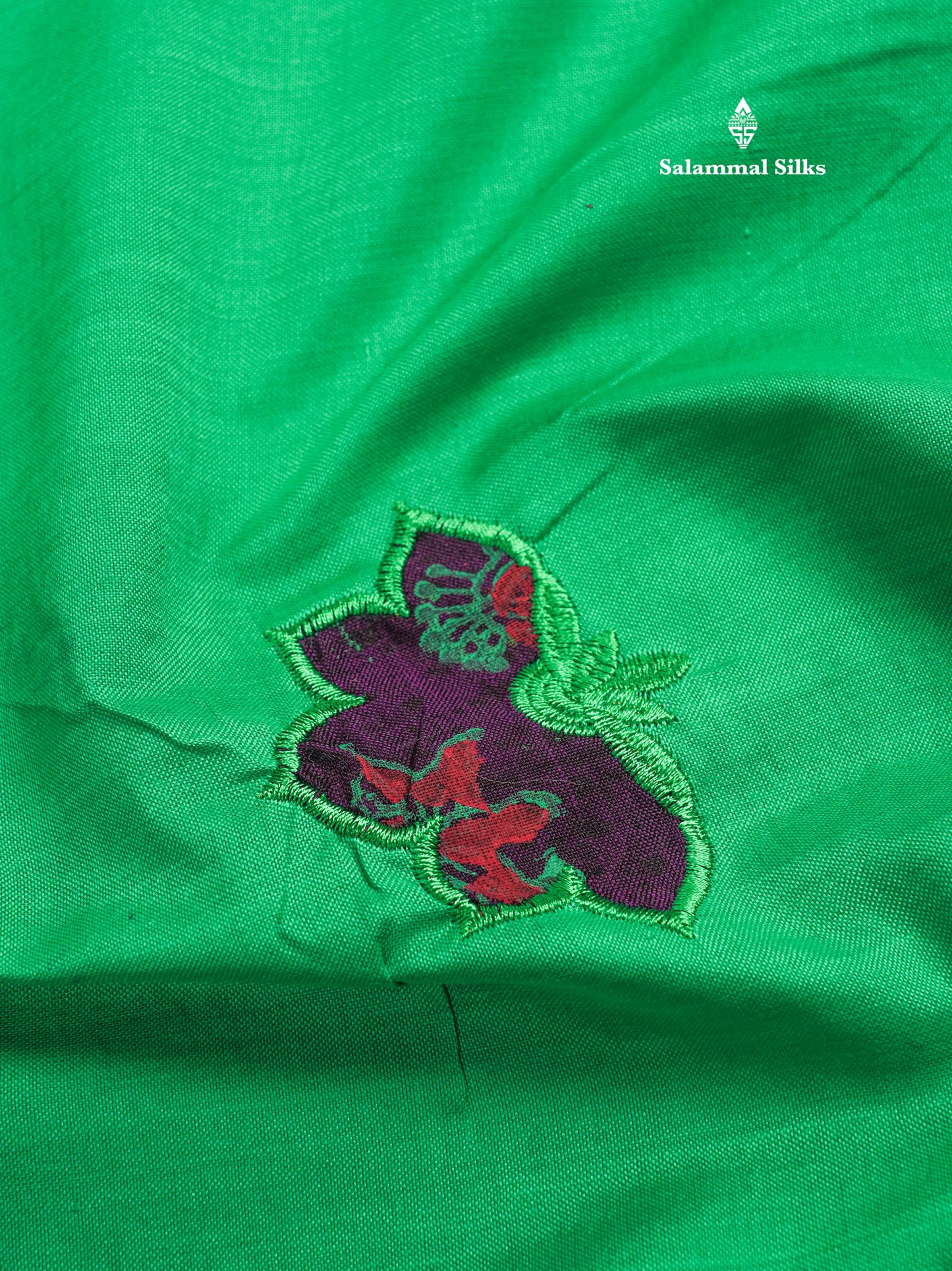 Saffire Green Mixed Cotton Printed Saree With Contrast Purple Blouse