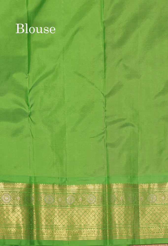 Pinkish Orange Colour Pure Kanjivaram Silk Saree With Contrast Parrot Green Border