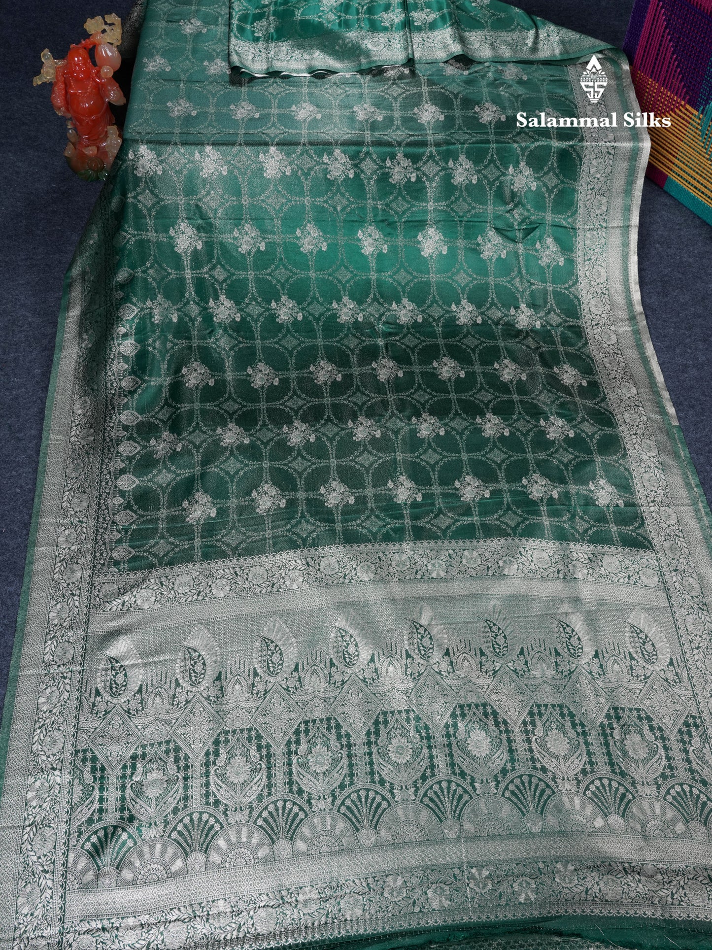 Beautiful Bottle Green Russian Silk Saree With Fancy Self Border