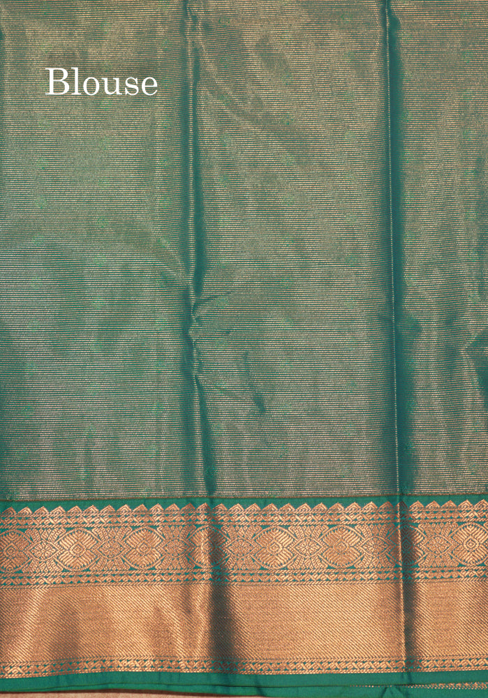Peach Colour Vaira Oosi Semi Silk Saree With Saffire Green Border