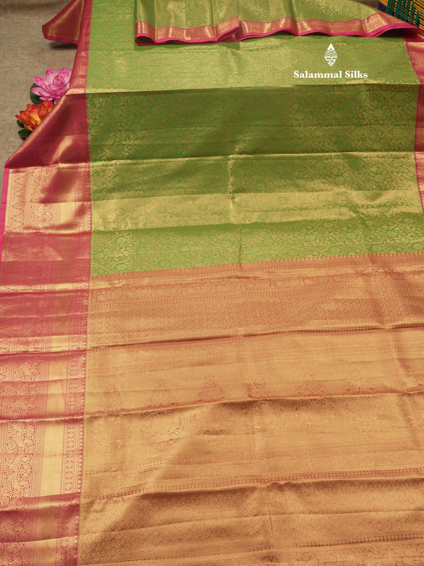Light Elaichi Green Tissue Bridal Semi Silk Saree With Contrast Pink Border
