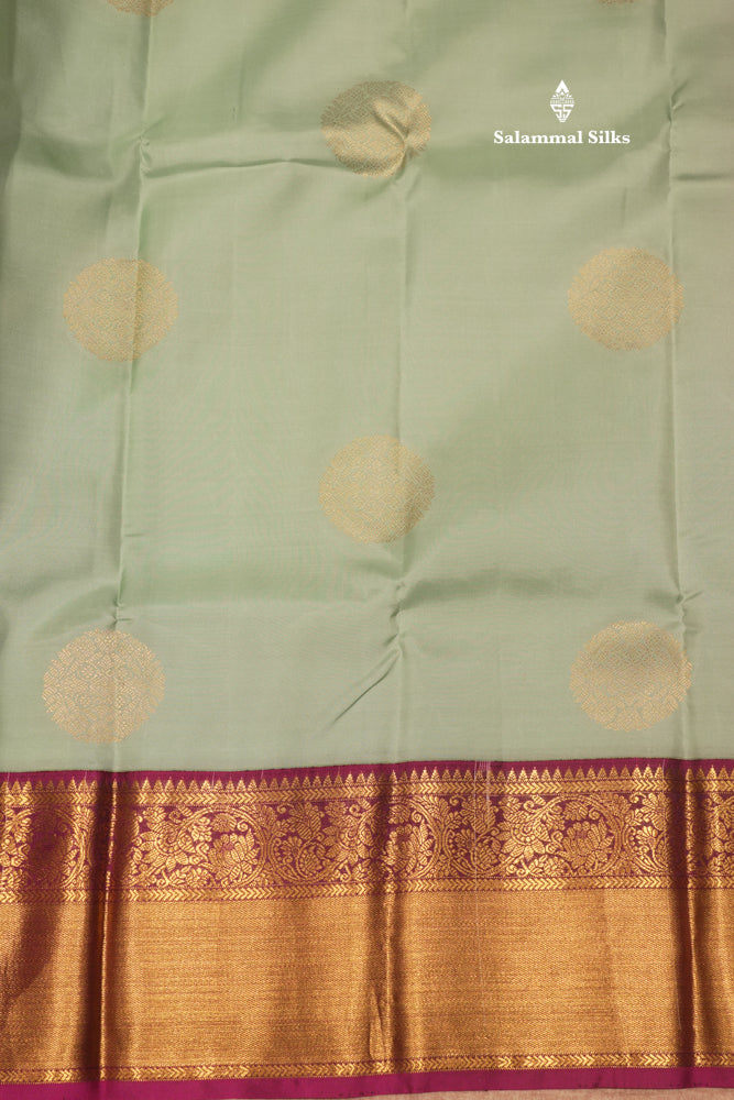 Korvai Light Green Colour Pure Kanjivaram Silk Saree With Contrast Magenta Border