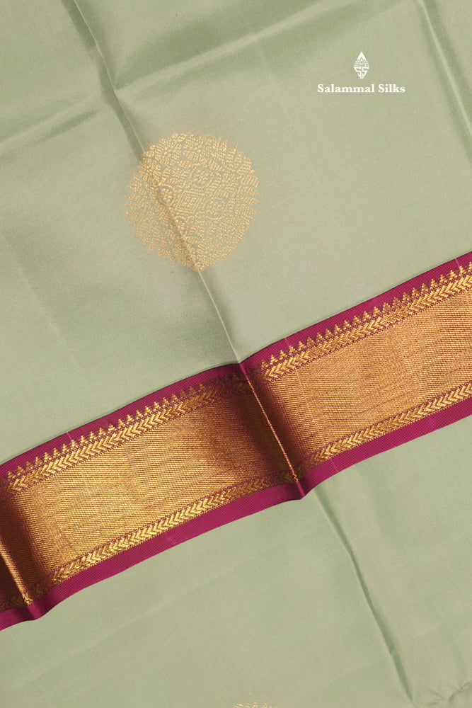 Korvai Light Green Colour Pure Kanjivaram Silk Saree With Contrast Magenta Border