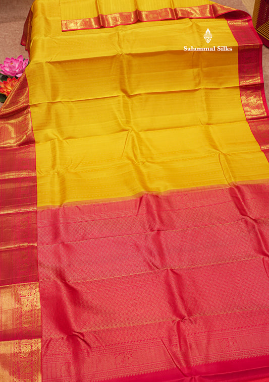 Korvai Yellow Pure Kanjivaram Silk Saree With Reddish Pink Border
