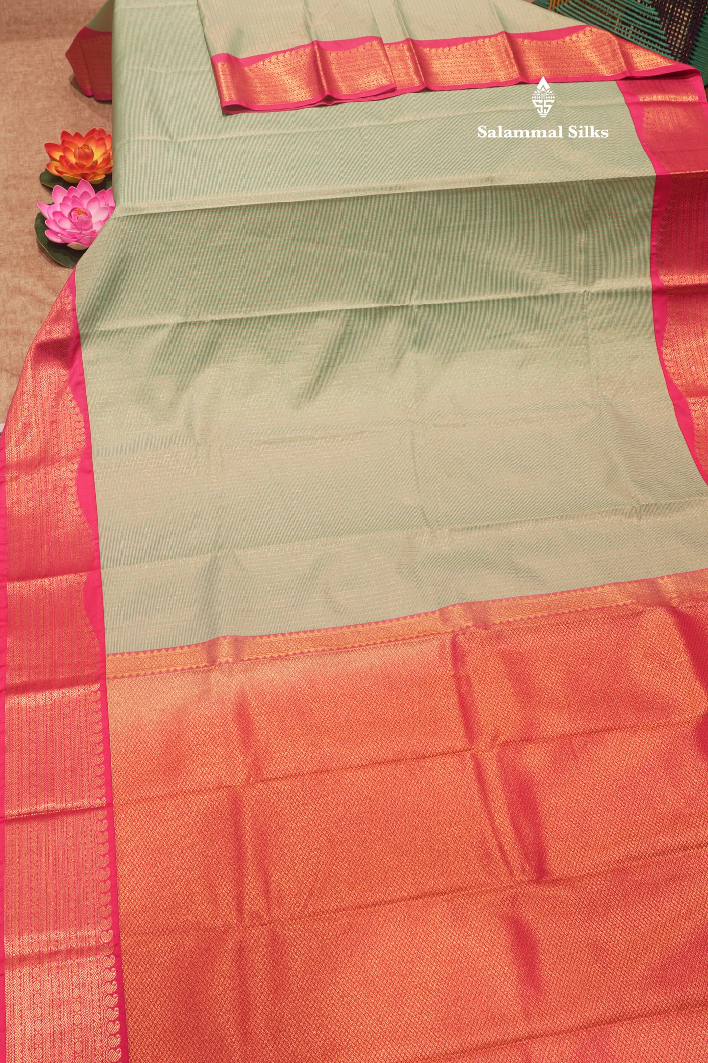 Light Green Colour Vaira Oosi Checks Semi Silk Saree With Contrast Pink Border