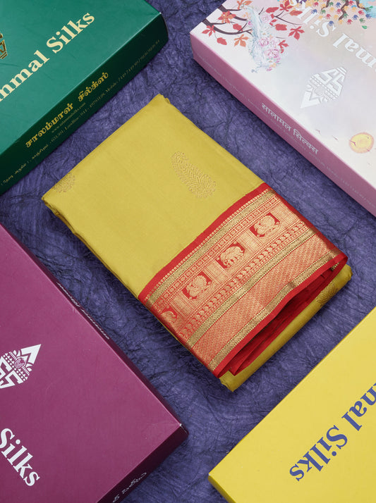 Manthulir Yellow Pure Kanjivaram Silk Saree With Contrast Chilly Red Traditional Border