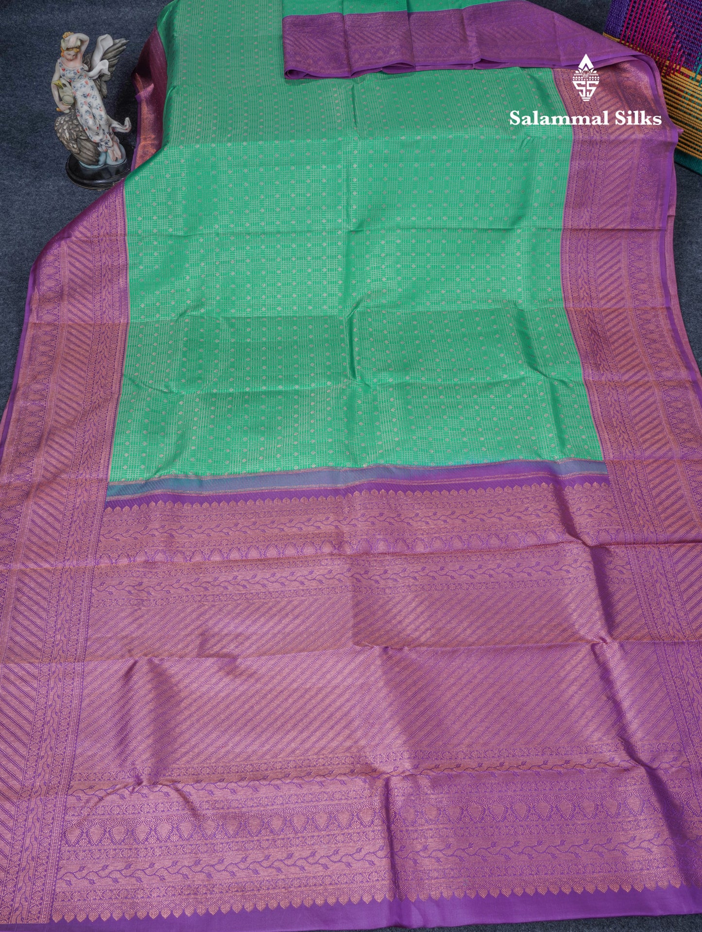 Sapphire Green Pure Kanjivaram Silk Saree with Contrast Purple Border