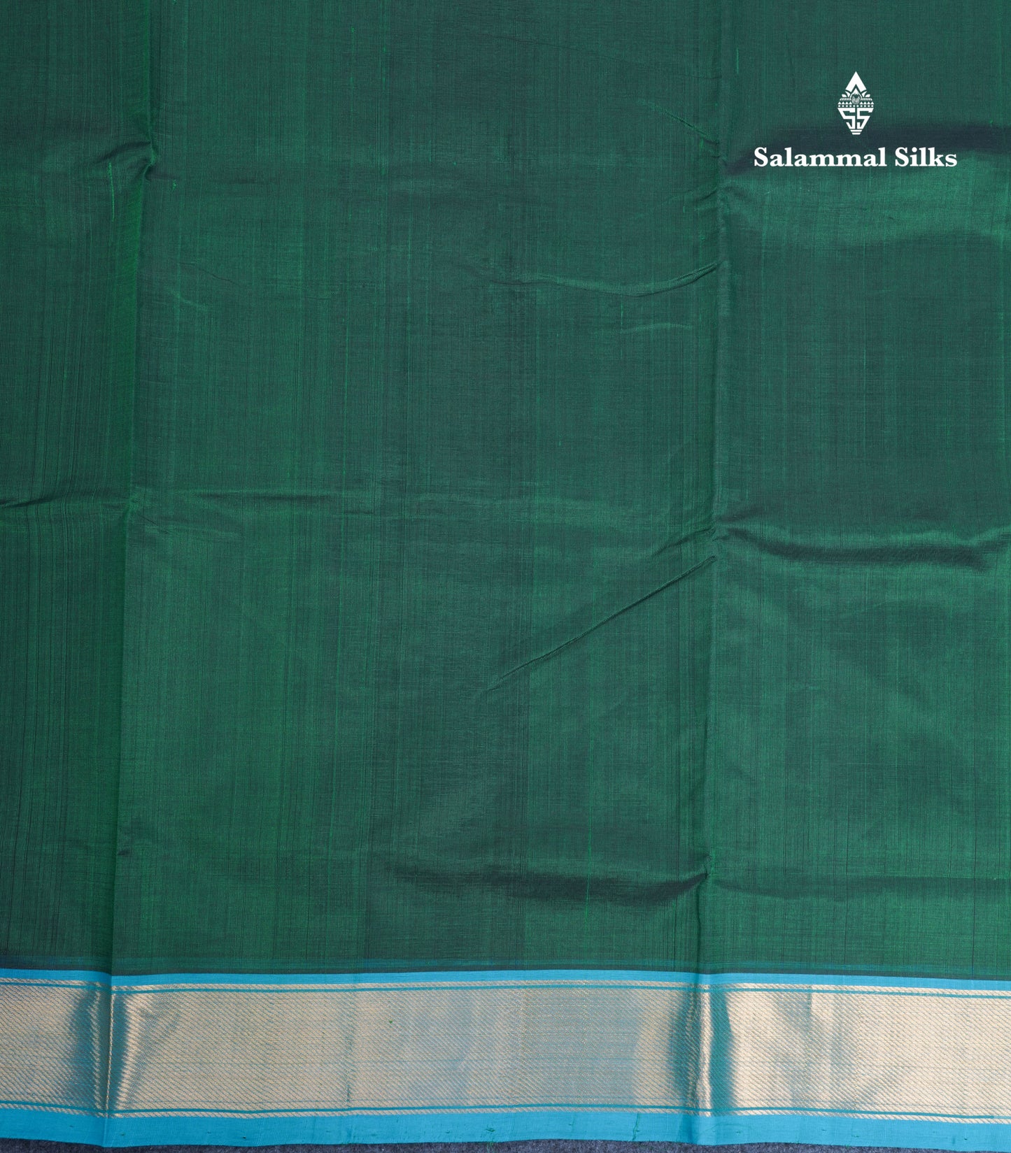 Bottle Green Plain Pure Silk Cotton Saree With Contrast Sky Blue Blouse