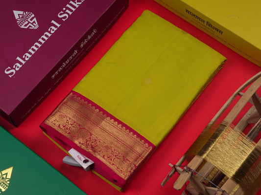 Vairaoosi Manthulir Yellow Colour Pure Kanjivaram Silk Saree with Contrast Small Pink Border