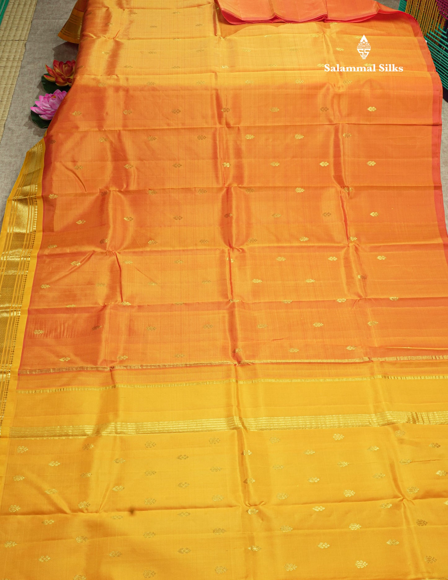Yellowish orange Pure Kanjivaram Silk Saree With One Side Contrast Yellow Border