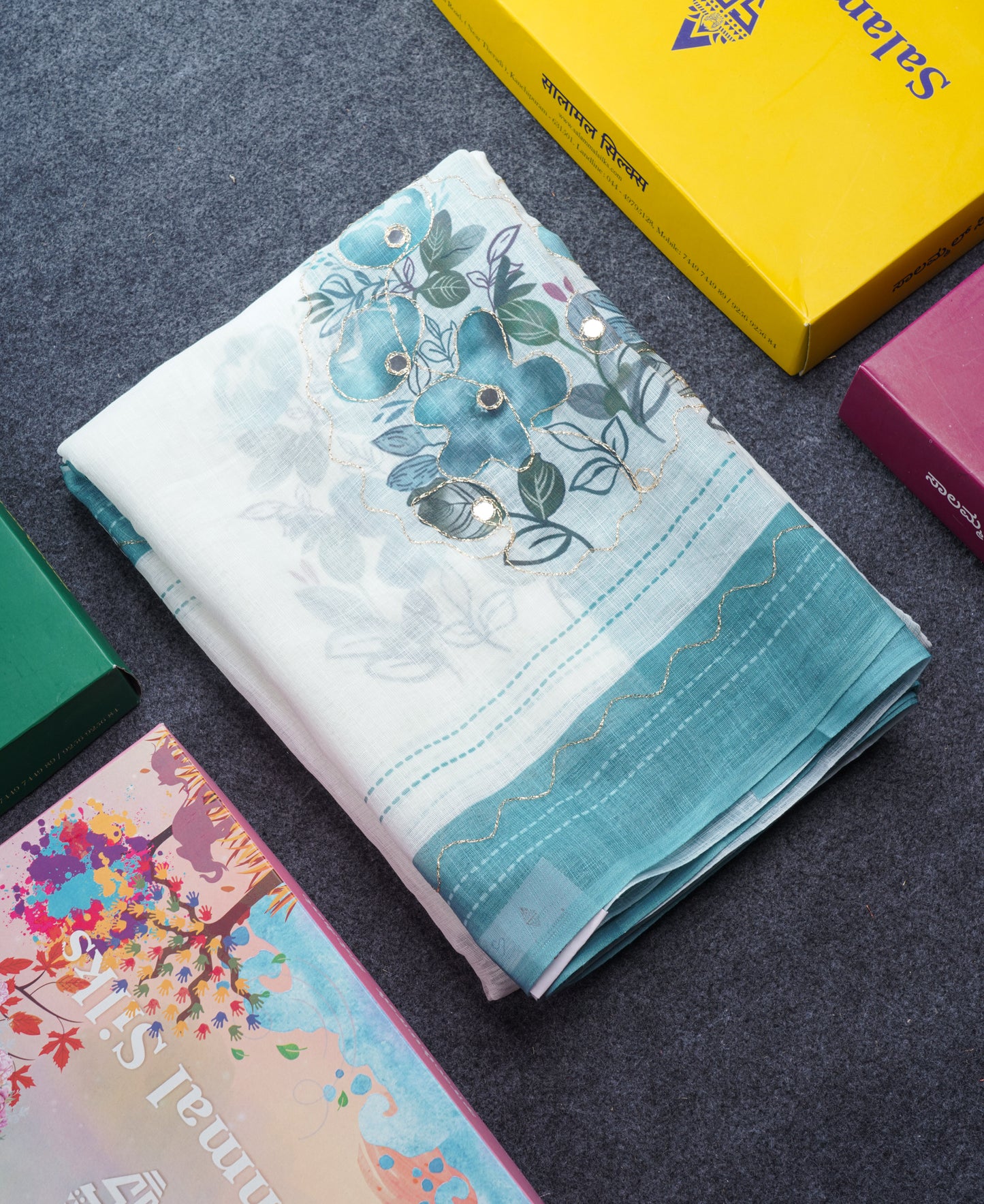 Beautiful White Mirror Work Linen Mix Saree With Contrast Brown Embroidery Zari Border