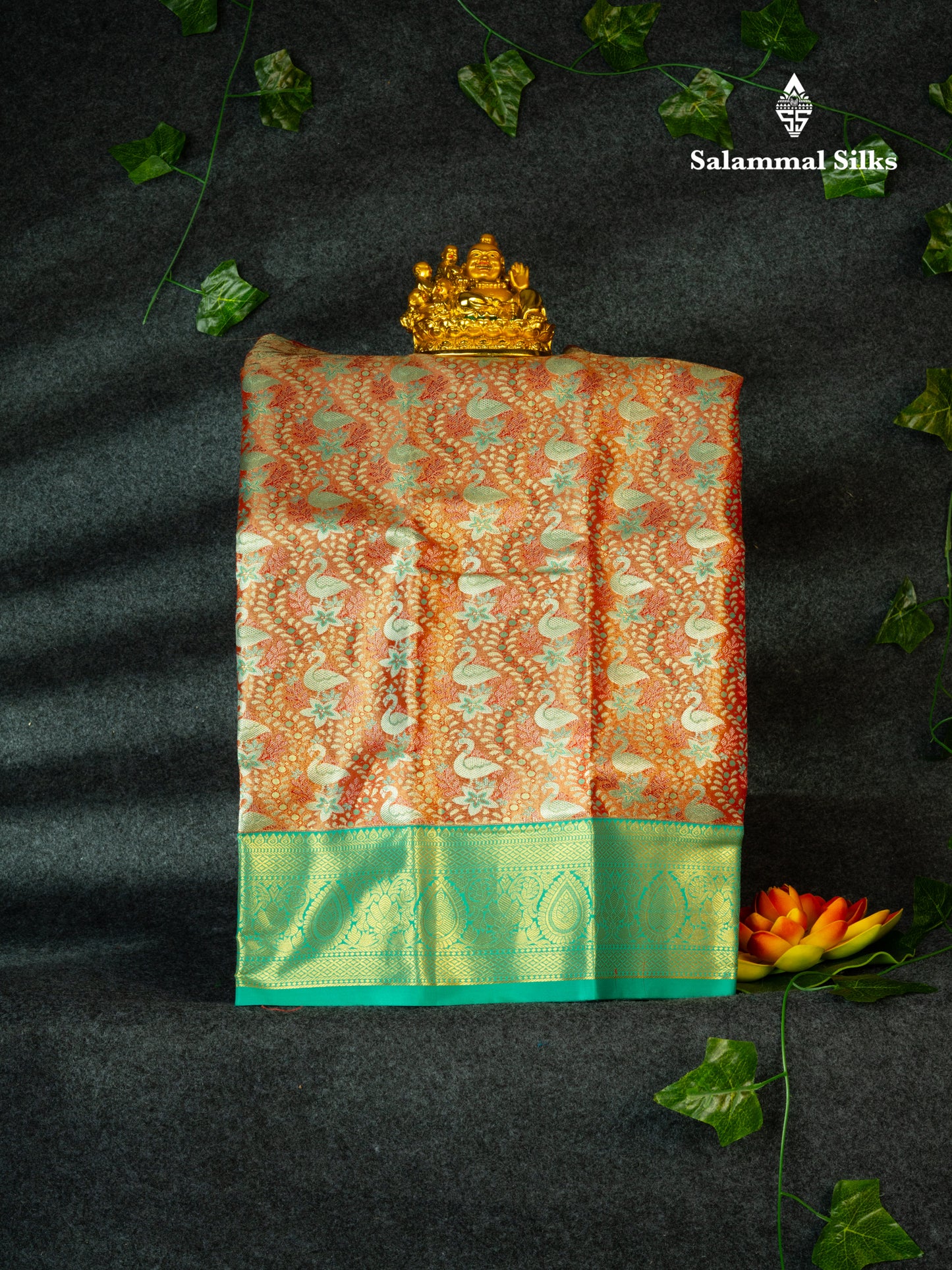Semi Silk Pattu Pavadai (Orange) with Sapphire Green Colour Blouse 18"