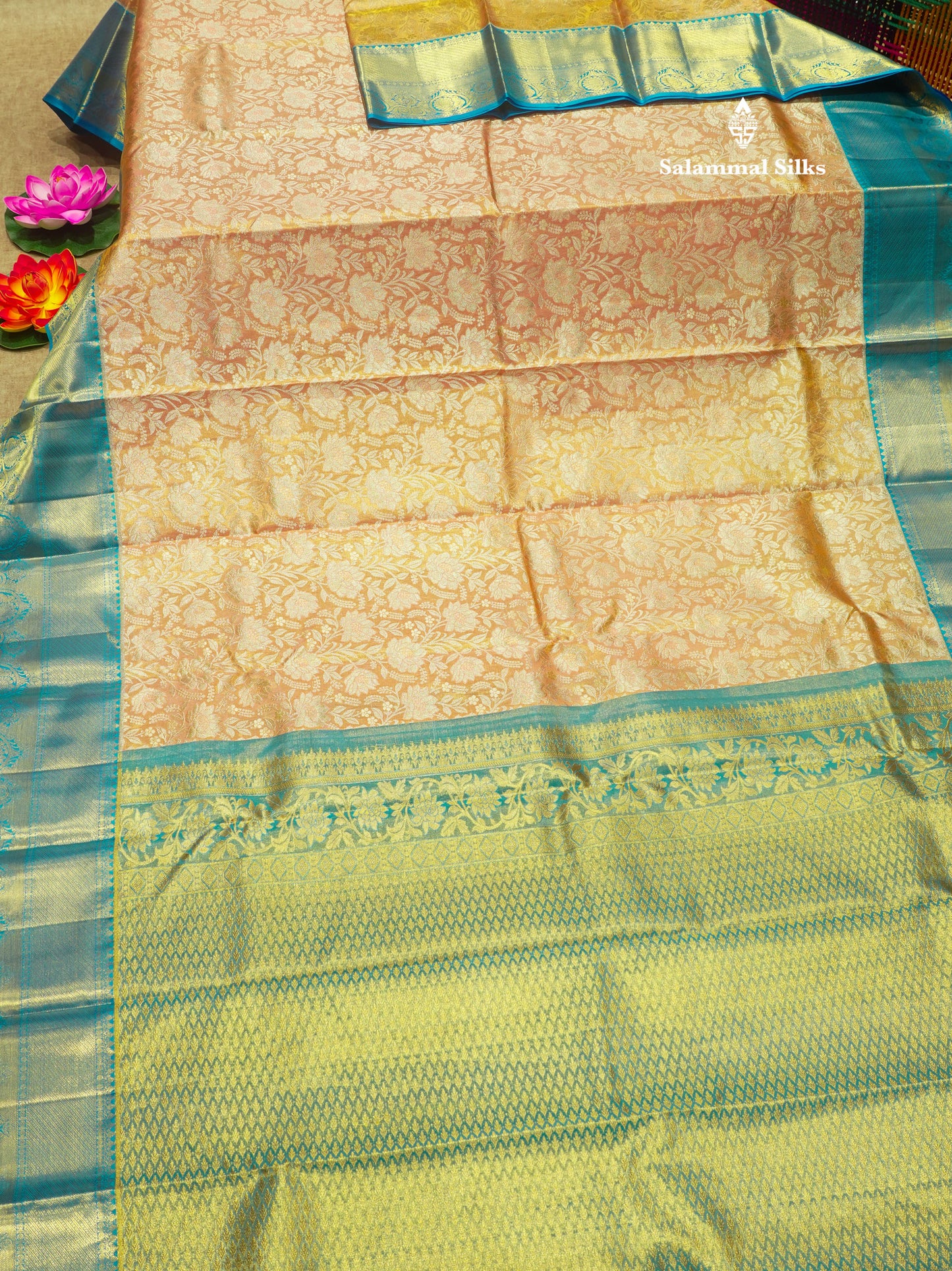 Kanjivaram Peach Tissue Pure Silk Saree With Contrast Blue Border