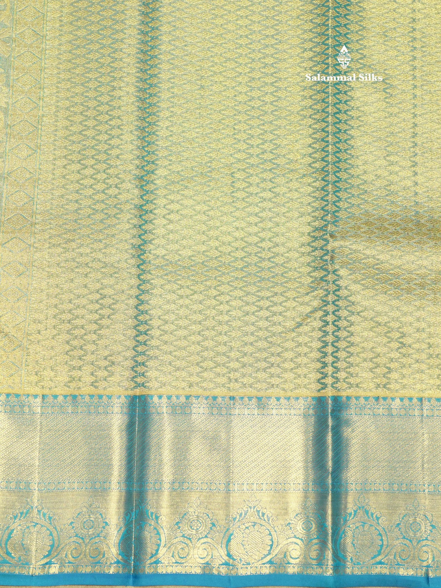 Kanjivaram Peach Tissue Pure Silk Saree With Contrast Blue Border