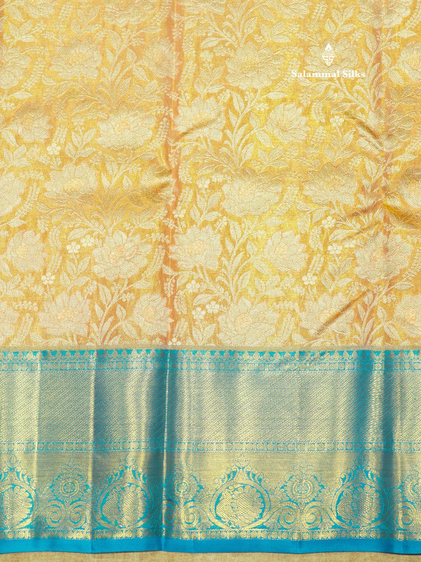 Kanjivaram Peach Tissue Pure Silk Saree With Contrast Blue Border