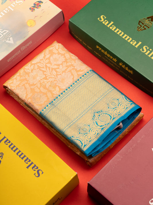 Kanjivaram Peach Tissue Pure Silk Saree With Contrast Blue Border