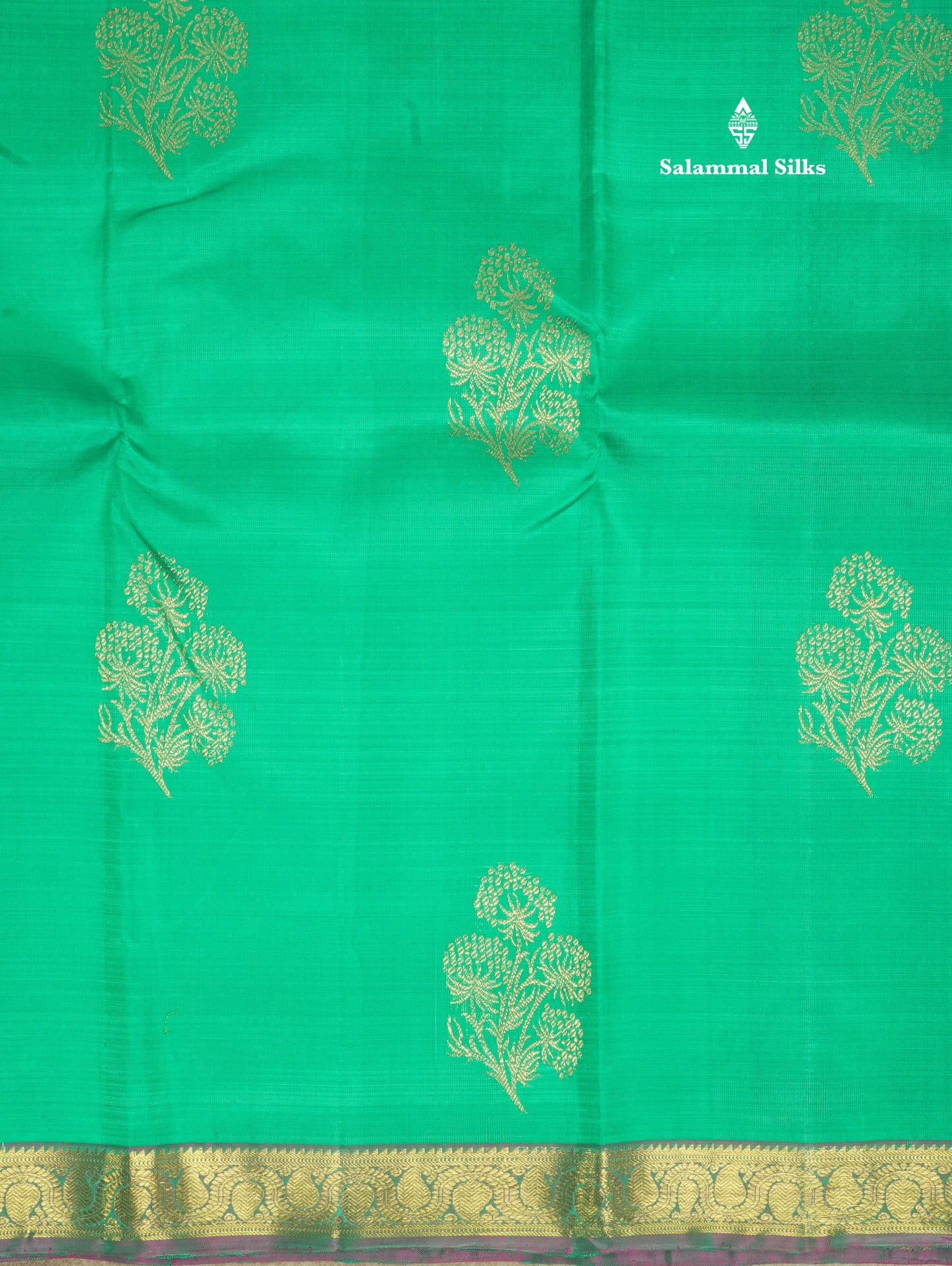 Saffire Green Pure Kanjivaram Silk Saree With Small Gold Zari Border