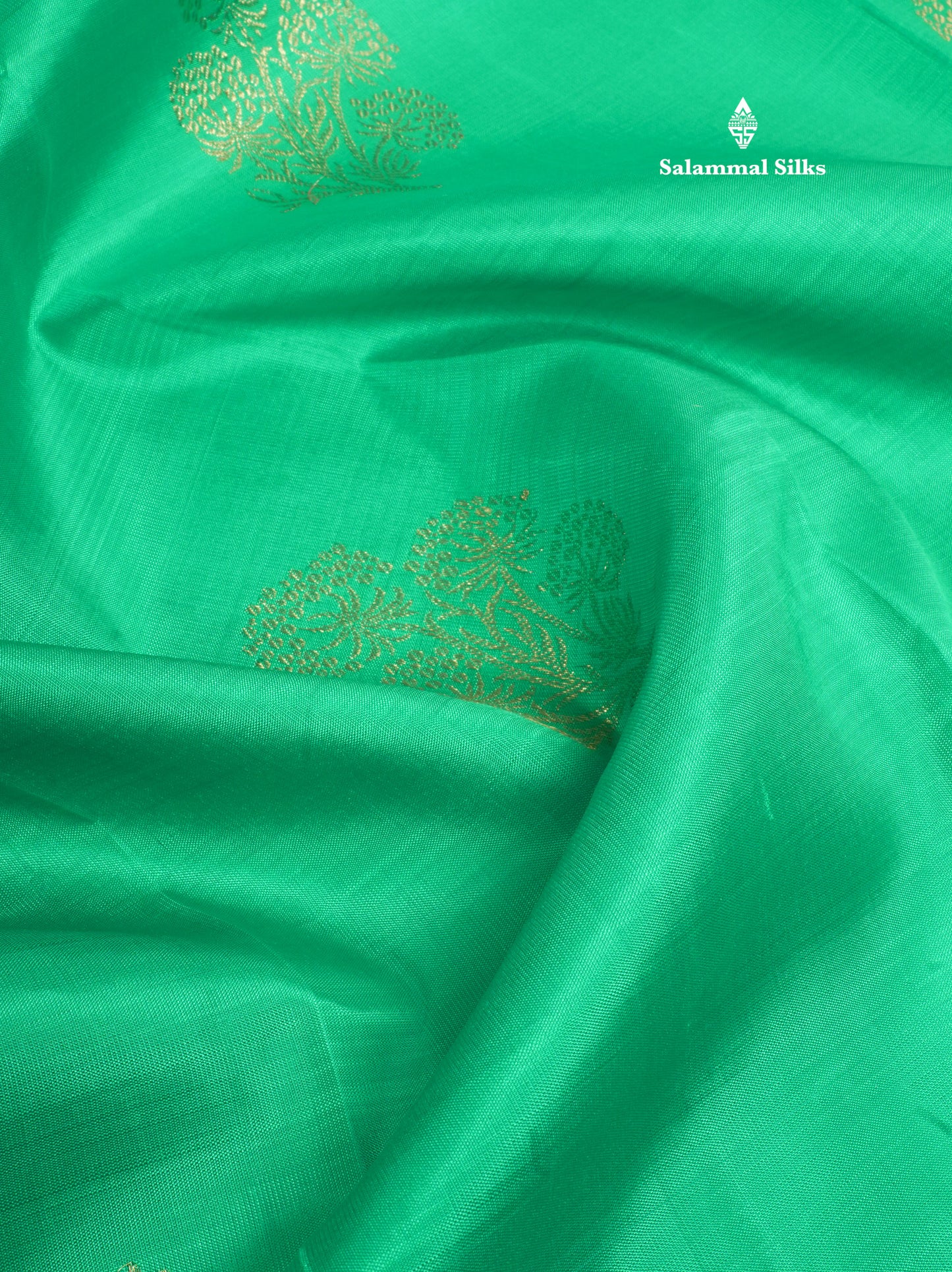 Saffire Green Pure Kanjivaram Silk Saree With Small Gold Zari Border