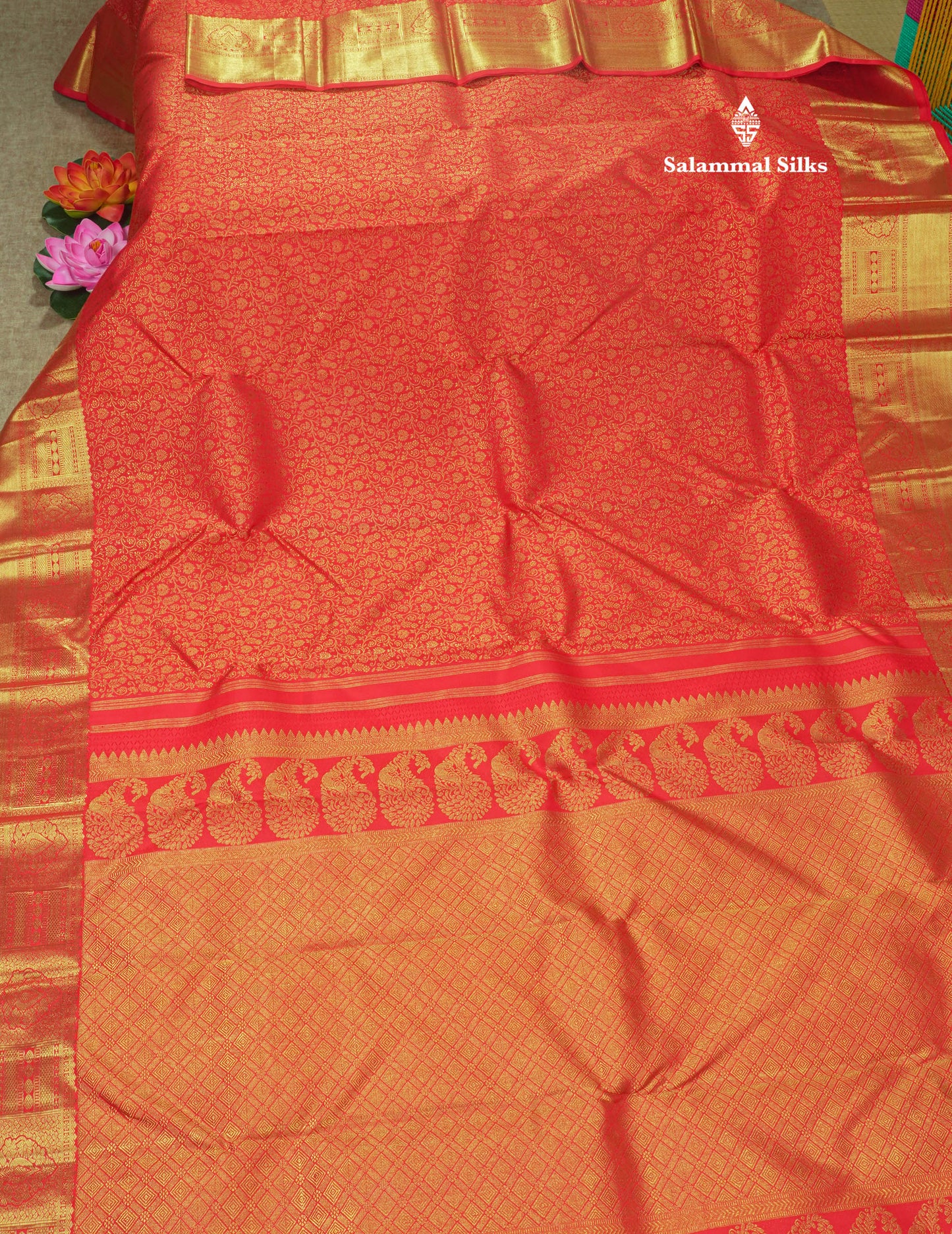 Pure zari (3G)
Bridal Chilly Red Pure Kanjivaram Silk Saree with Traditional Gold Zari Border