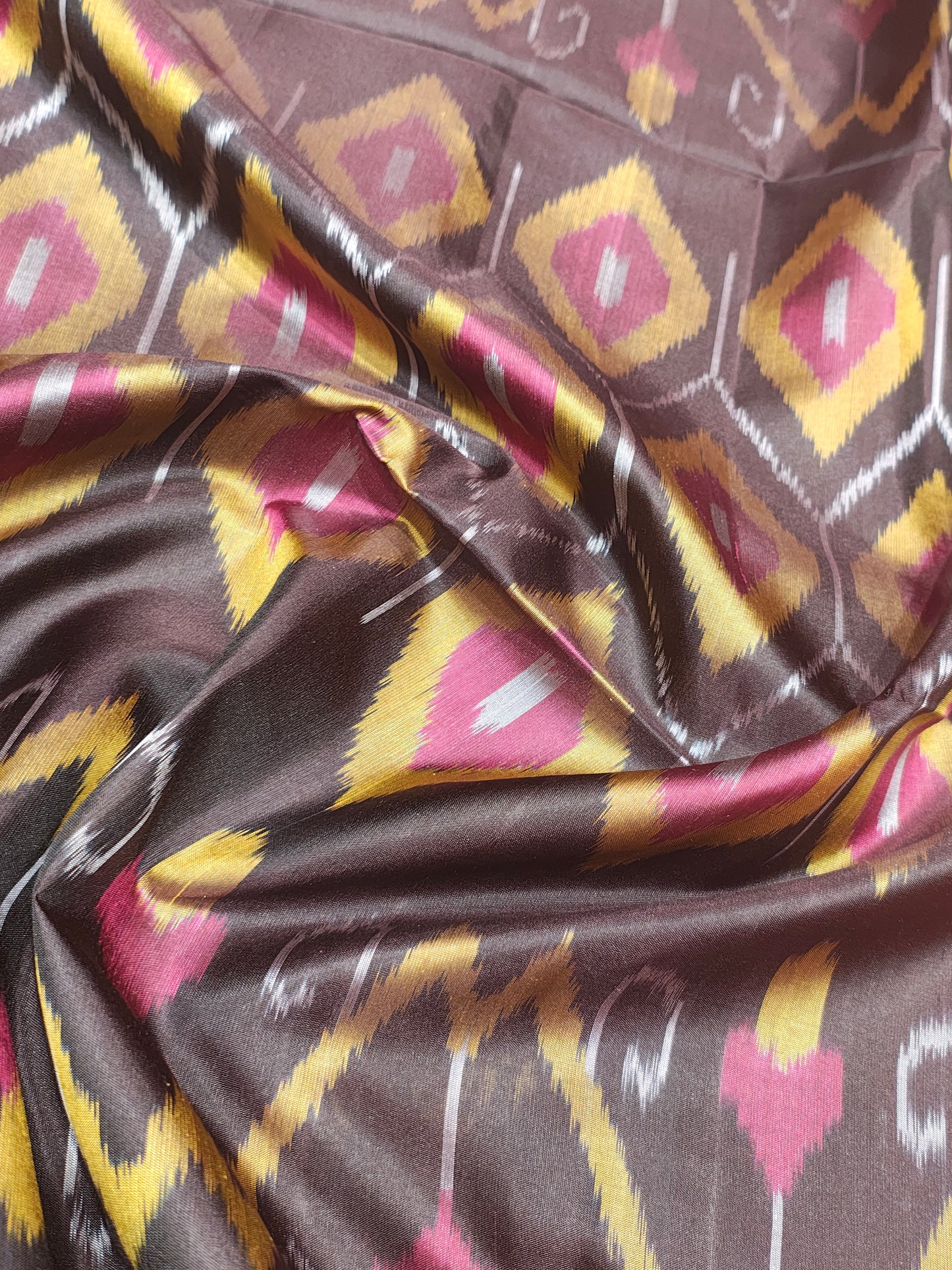 Chocolet Brown Beautiful Ikkat Fancy Pure Soft Silk Saree With Pinkish Orange Border
