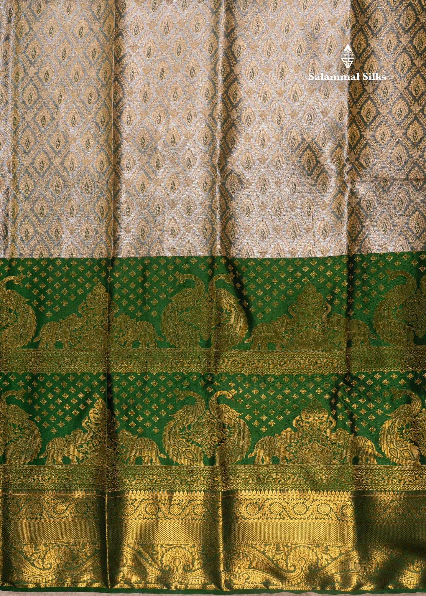 Cream Colour Tissue Semi Silk Saree With Bottle Green Border