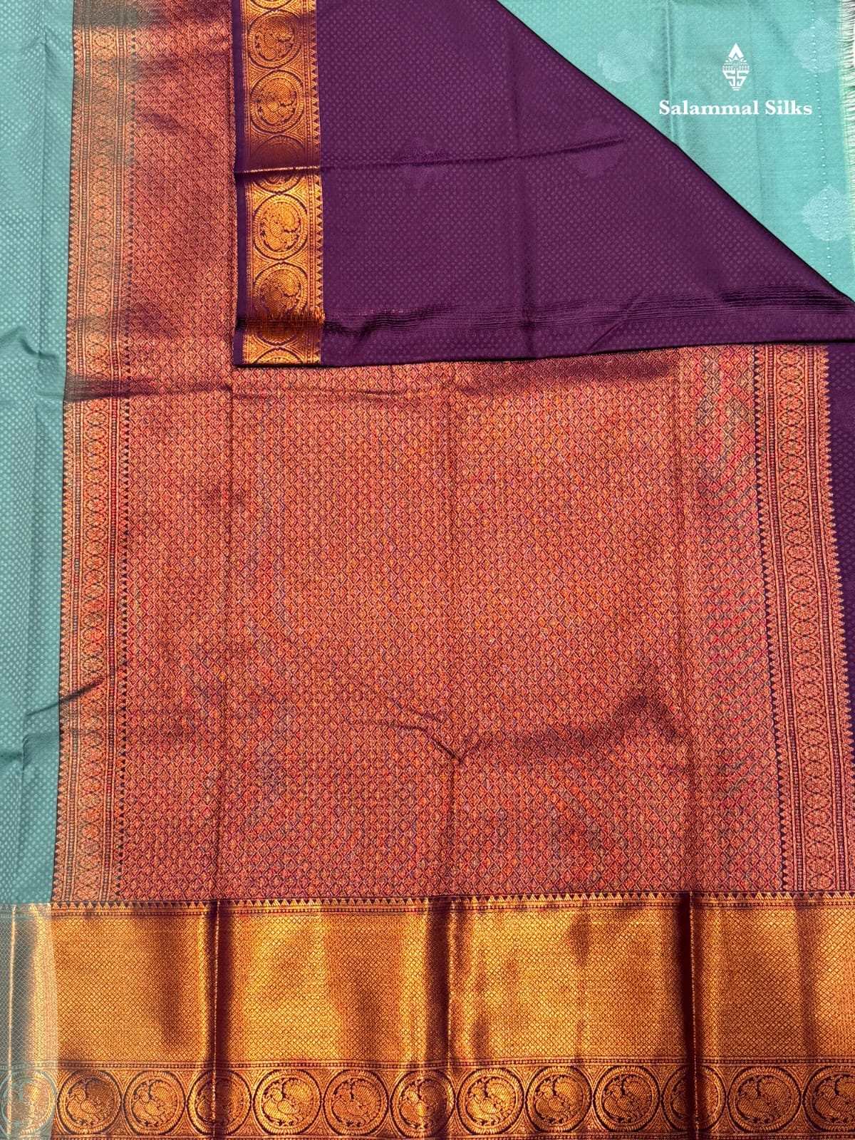 Embose Butta Light Ananda Semi Silk Saree With Copper Border