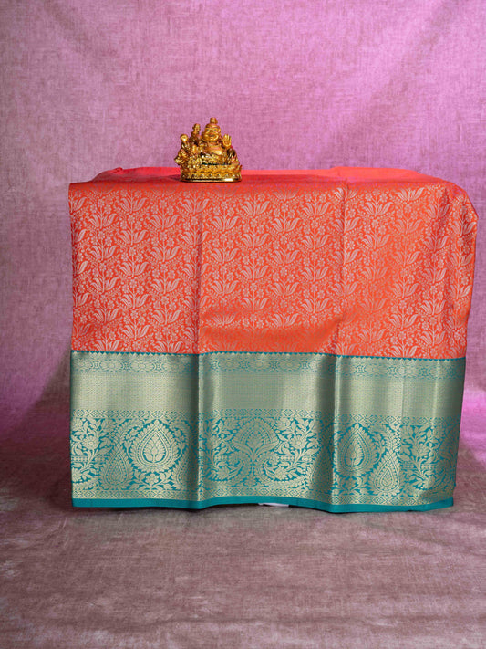 Mix Pattu Pavadai (Pinkish Orange) With Peacock Green Blouse 44"