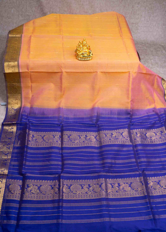Peach Kanjivaram Pure Silk Cotton with Violet Blouse