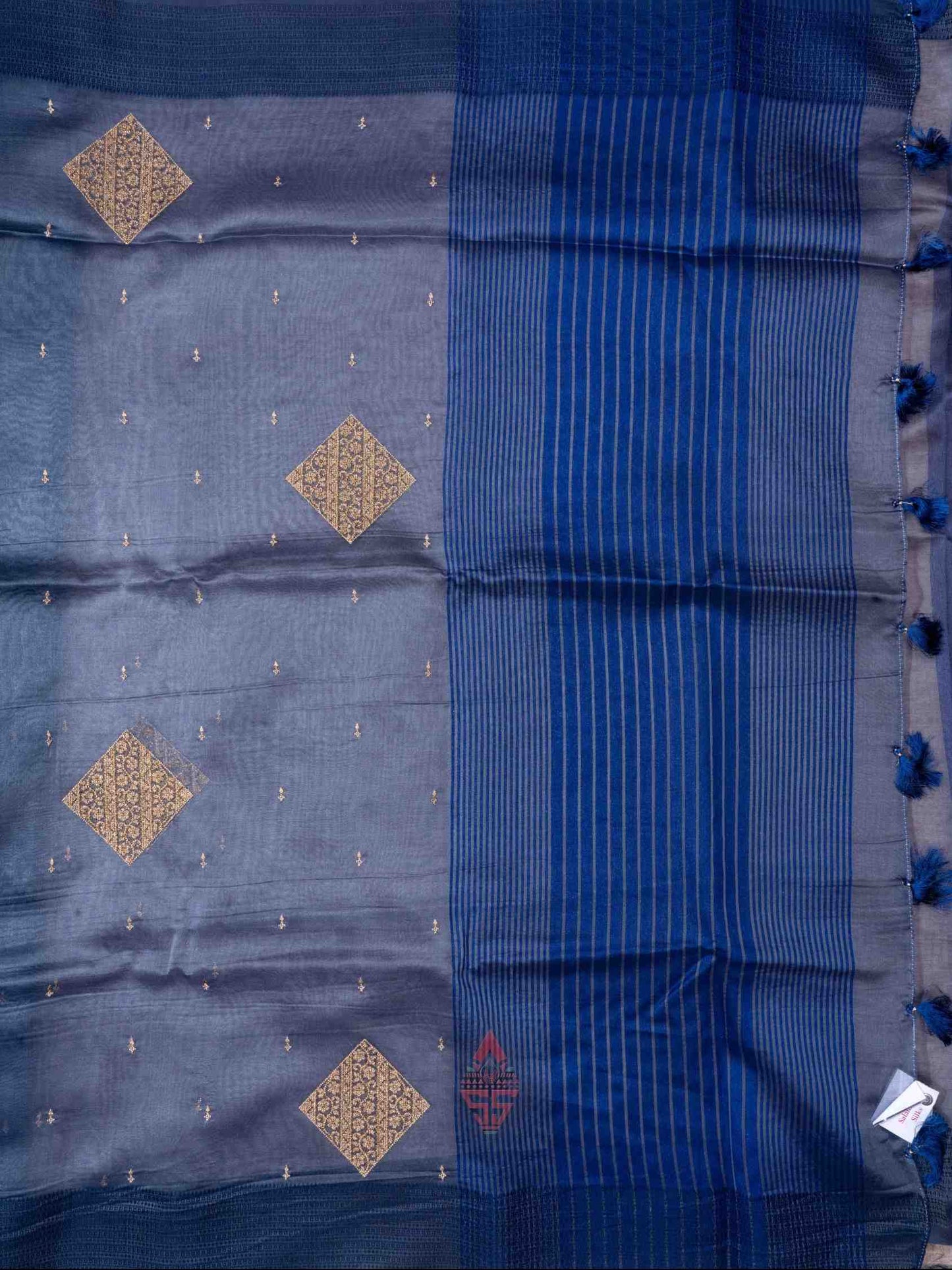 Grey color Organza Fancy Saree with Dark Blue Border