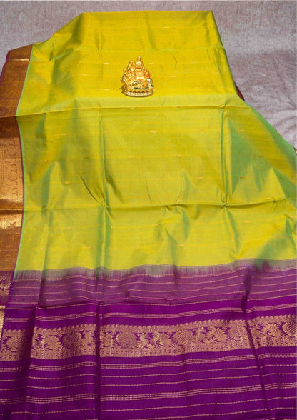 Manthulir Yellow Kanjivaram Pure Silk Cotton with Violet Blouse