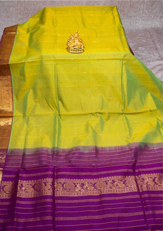 Manthulir Yellow Kanjivaram Pure Silk Cotton with Violet Blouse