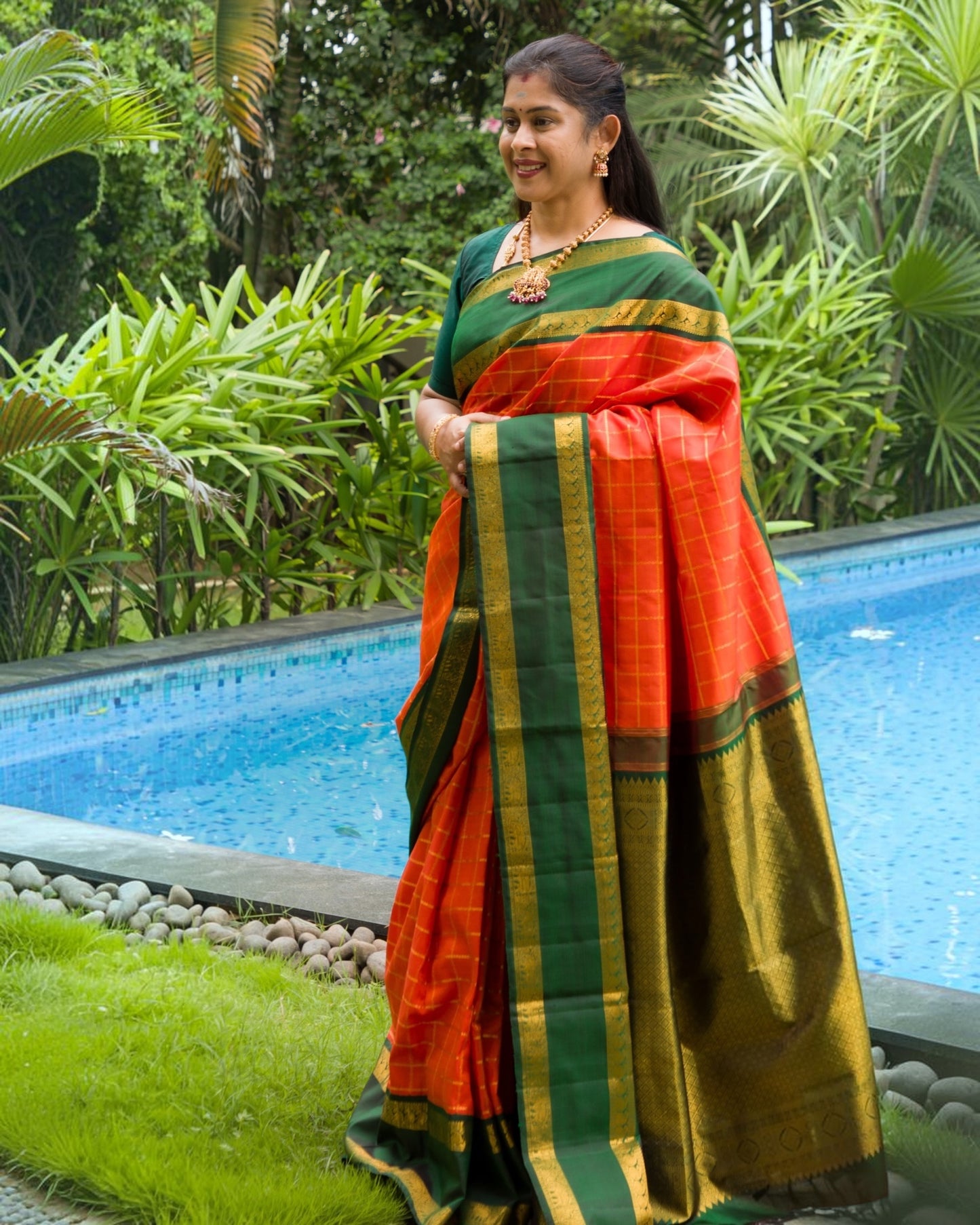 Orange Veldhari Zari Checks Kanjivaram Silk Saree With Contrast Bottle Green Traditional Rettapet Border