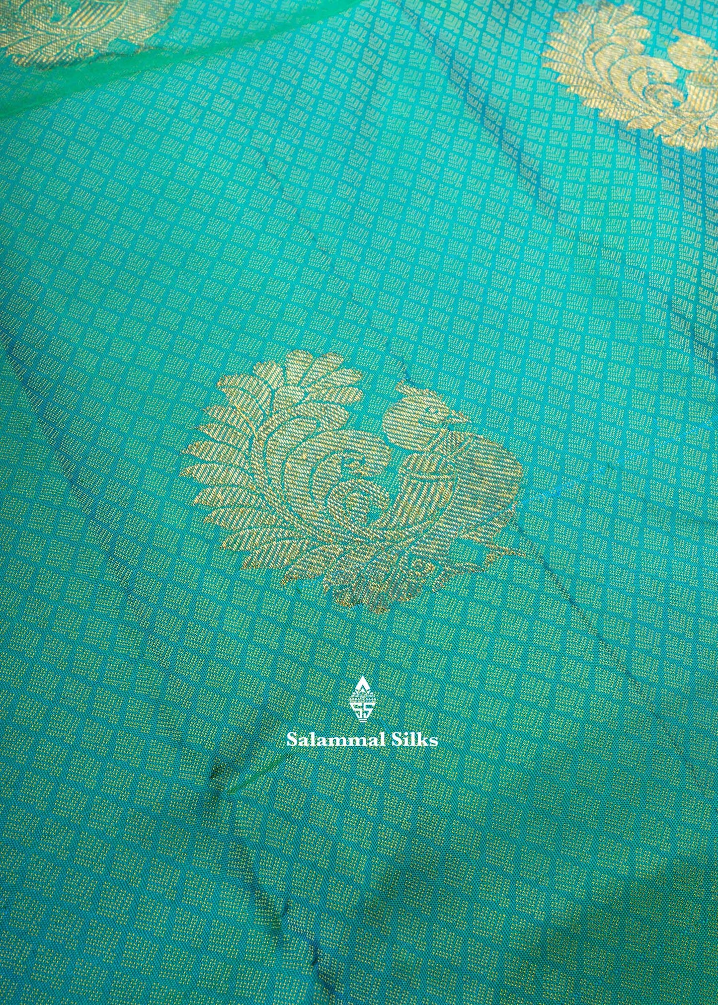 Kanjivaram Sapphire Green Pure Silk Jacquard Saree With Purple Blouse
