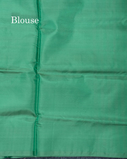 Light Orange Banana Pinth Saree (Vaazhainaar Pattu) With Contrast Saffire Green Blouse