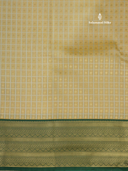 1000 Buttas Light Peach Semi Silk Saree With Contrast Bottle Green Border