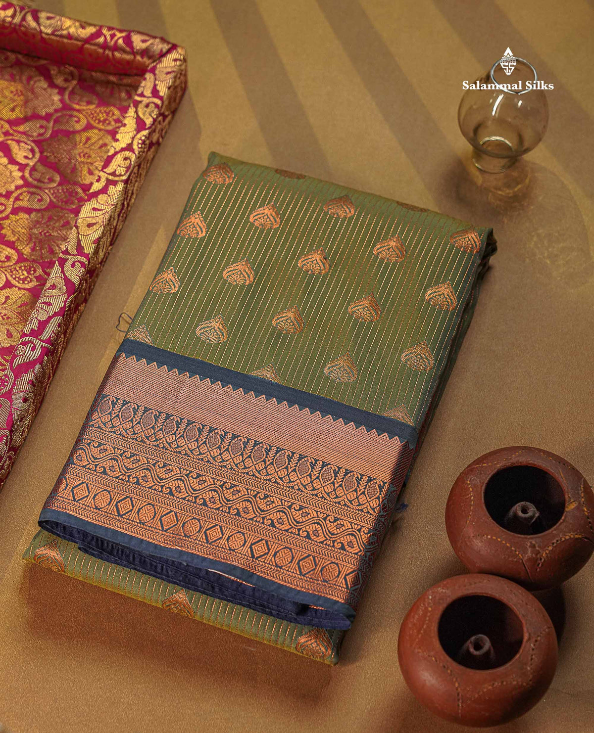 Beautiful Light Elaichi Green Zari Lines With Butta Semi Silk Saree With Contrast Dual Tone Blue Traditional Border