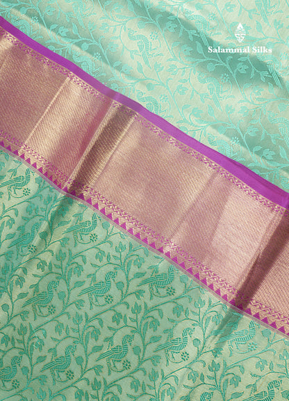 Beautiful Light Green Tissue Bridal Pure Kanjivaram Silk Saree With Contrast Purple Pallaku Border