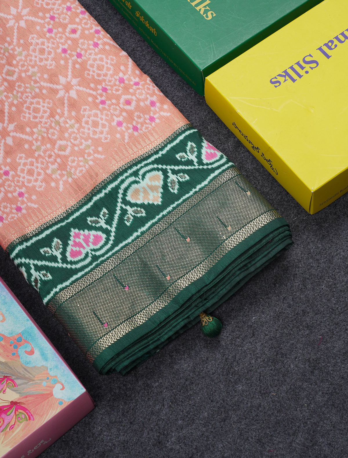Beautiful Peach Ikkat Dola Fancy Saree With Bottle Green Border