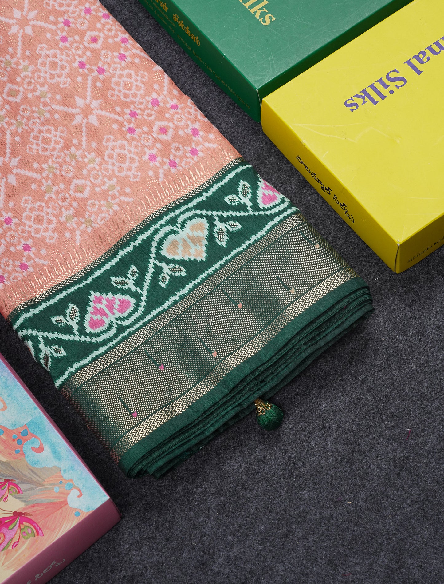 Beautiful Peach Ikkat Dola Fancy Saree With Bottle Green Border