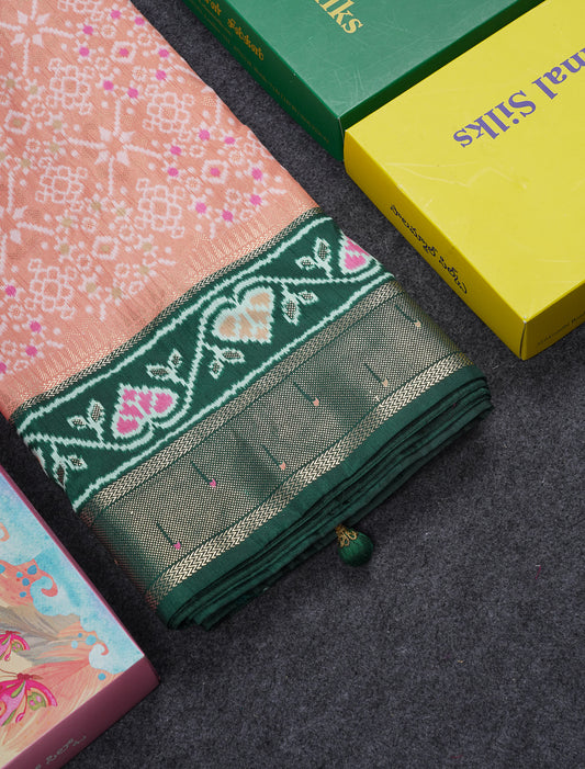 Beautiful Peach Ikkat Dola Fancy Saree With Bottle Green Border
