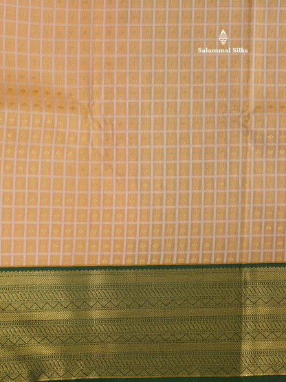 1000 Buttas Light Peach Semi Silk Saree With Contrast Bottle Green Border