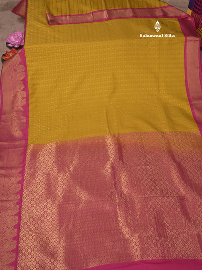 1000 Buttas Mustard Yellow Semi Silk Saree With Contrast Pink Traditional Border