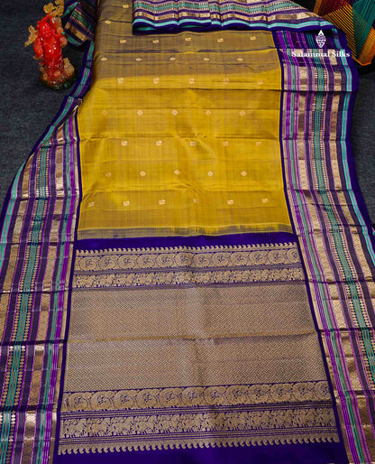 Pure Kanjivaram Silk Saree - Olive Green Zari Butta Along With Contrast Dual Tone Navy Blue Traditional Long Border