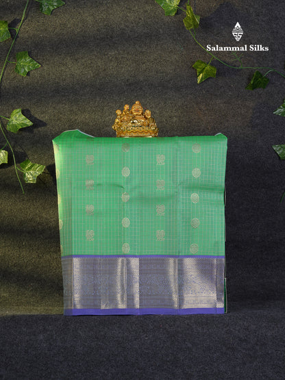 Beautiful Pure Silk Pattu Pavadai Zari Checks With Butta (Sapphire Green) With Contrast Violet Blouse 18"