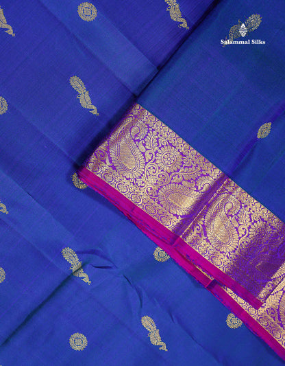 Pure Kanjivaram Silk Saree - Dual Tone Peacock Blue Chakaram & Peacock Butta Along With Contrast Dual Tone Purple Traditional Evening Morning Border