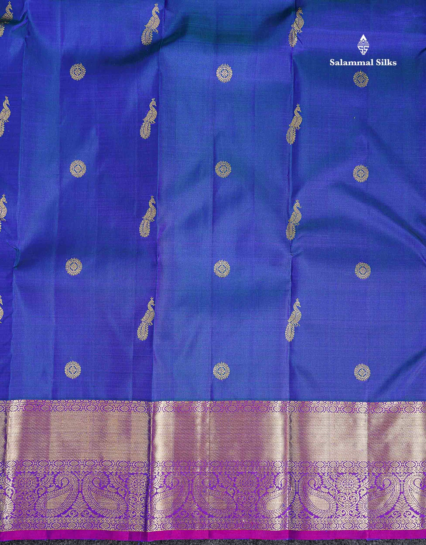 Pure Kanjivaram Silk Saree - Dual Tone Peacock Blue Chakaram & Peacock Butta Along With Contrast Dual Tone Purple Traditional Evening Morning Border